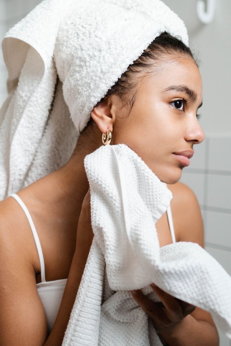 Woman touching her face looking concerned about sudden skin irritation